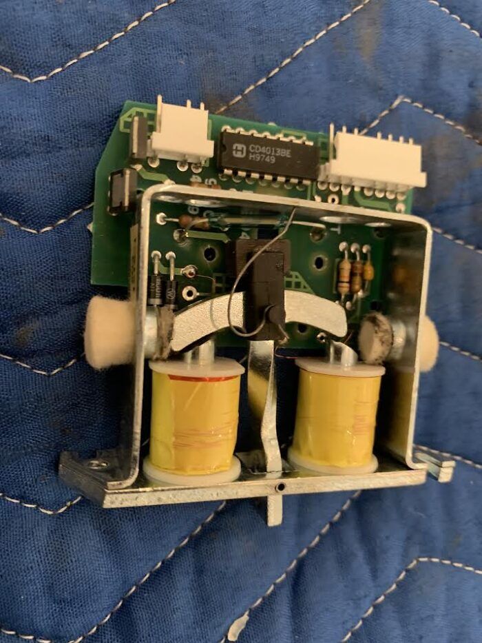 Allen stop action/coupler magnet